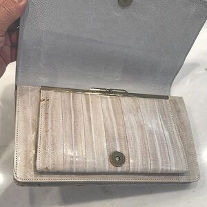 Vintage authentic eel skin purse in neutral cream, beige, taupe colors.